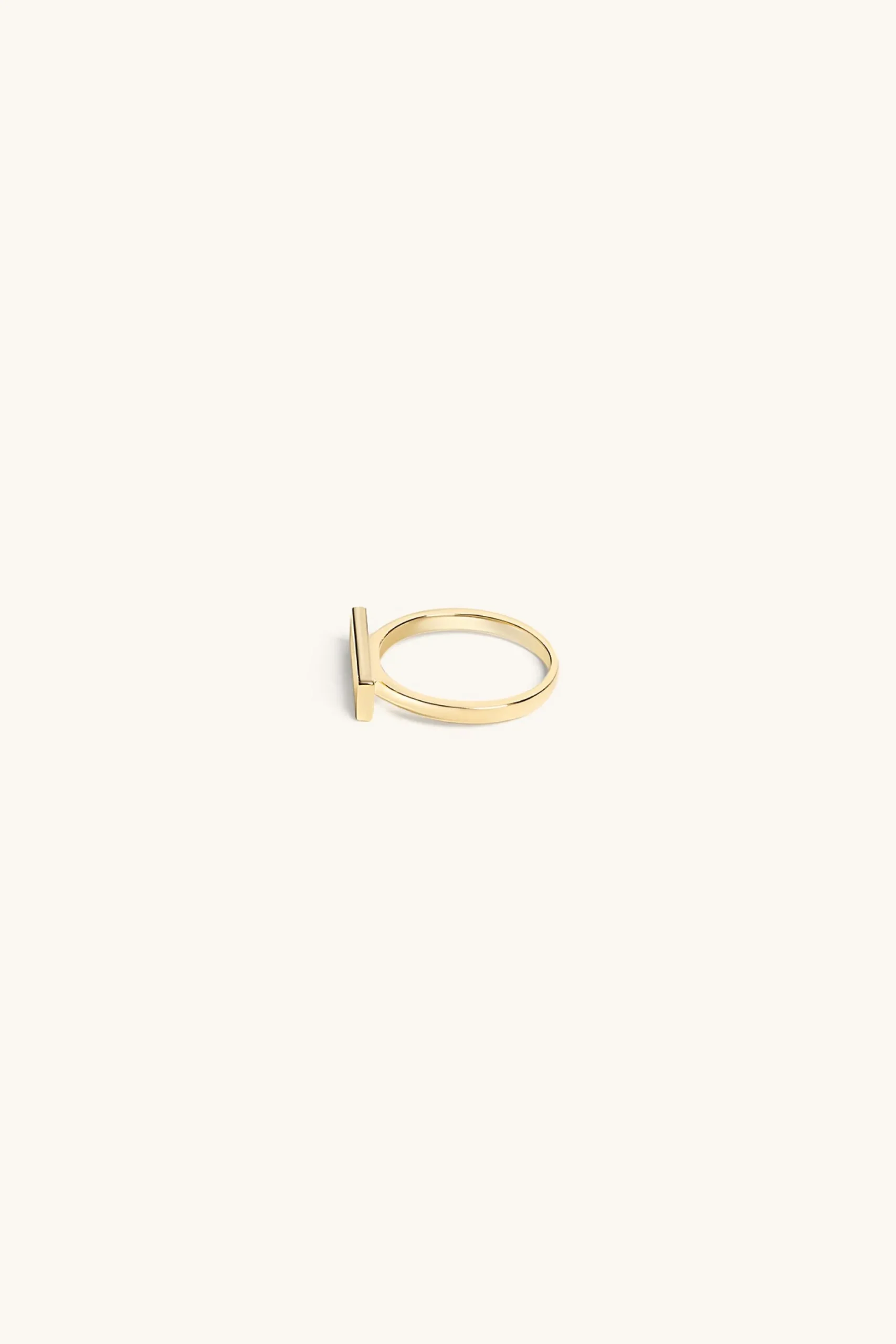 logo_stacker_ring_kt_gold_2.webp 18Kt Gold Plated | Jewellery-BLANK SPACE. LOGO STACKER RING 18KT GOLD